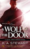 A Wolf at the Door (Jesse James Dawson #3) by K.A. Stewart