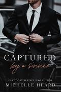 Captured by a Sinner by Michelle Heard
