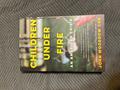 Children Under Fire: An American Crisis by John Woodrow Cox